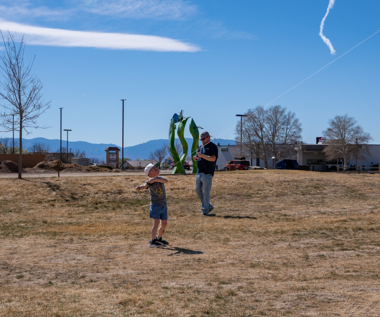 Pueblo West, CO - Kites and Coffee - Kid flying kite