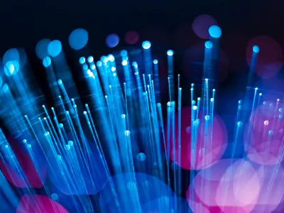 fiber-optic cables glowing with light