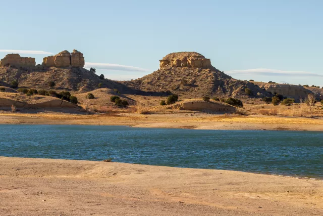 Person walking along landscape of Lake Pueblo State Park in Southern Colorado